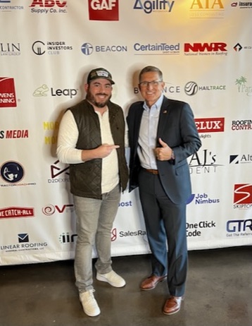 Guest photo at ACS Summit sponsor wall